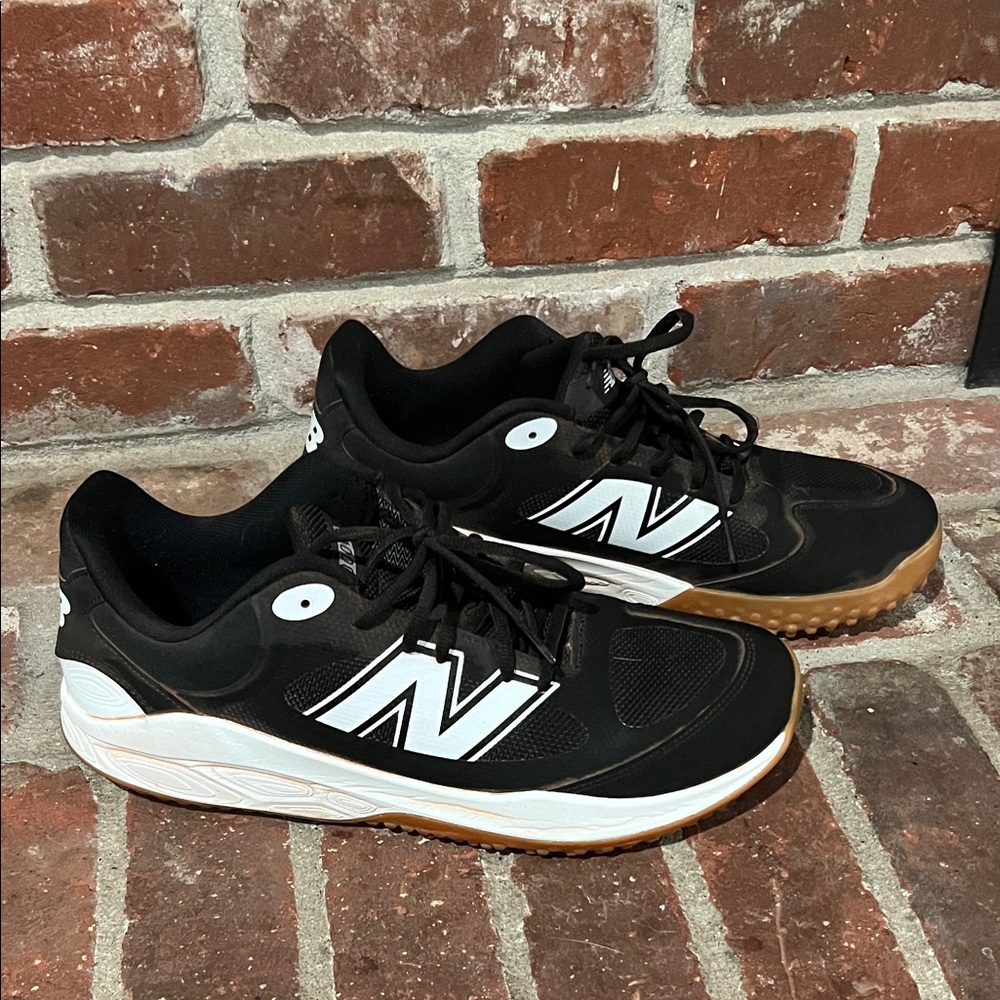 New Balance Black and White Turf Shoes
